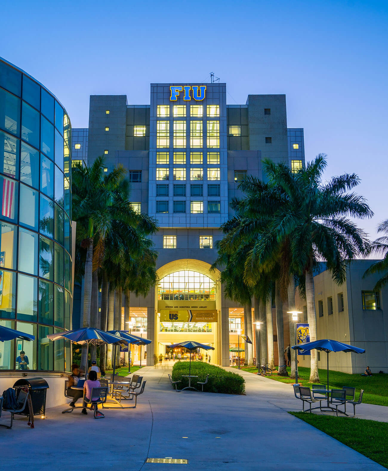 Kung Fu Chicken FIU Graduates Image signifying the founders of Kung Fu Chicken graduating from Florida International University (FIU) in Miami in 2011.